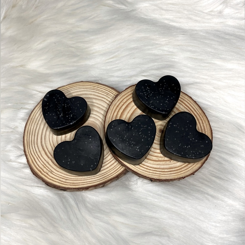 Charcoal, tea tree, orange and poppy seeds face mini scrub soaps.